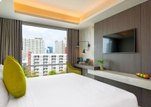 Номер Deluxe в Maitria Hotel Rama 9 Bangkok