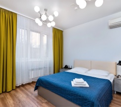 Однокомнатные апартаменты-студия с барной стойкой в APARTVILLE