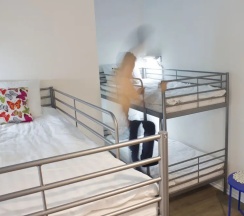 Кровать в общем номере в Warsaw Downtown Hostel