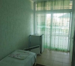 Двухместные семейные апартаменты с 2 комнатами двуспальная кровать в Уютный дворик