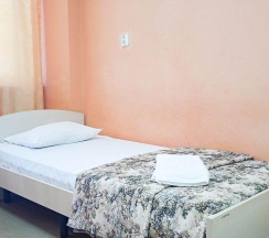 Кровать в 4-местном общем номере в Smart Hotel KDO Пенза