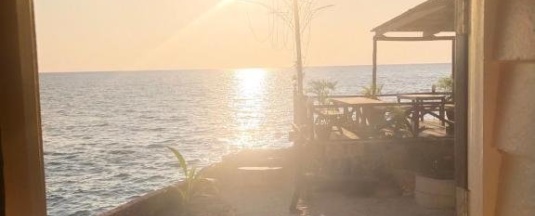 Одноместный номер Standard с балконом и с видом на море двуспальная кровать в Rock Sand Resort