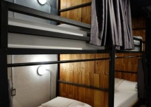 Кровать в общем номере в Sleepcase Hostel