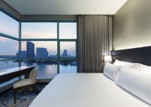 Двухместный люкс c 1 комнатой с видом на реку двуспальная кровать в Chatrium Hotel Riverside Bangkok