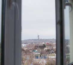 Апартаменты c 1 комнатой в Квартира с закрытой парковкой 10 минут до Мамаева Кургана на машине