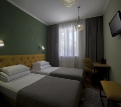 Номер стандарт с 2 односпальными кроватями в Альпина