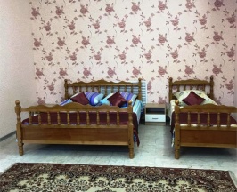 Семейный номер с собственной кухней в Адель