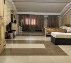 Трёхместный Стандартный номер с двуспальной и односпальной кроватями в Grand