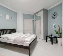Четырёхместные апартаменты c 1 комнатой с балконом в Апартаменты Light apartment lxt.by