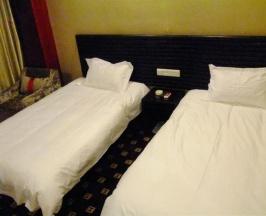Двухместный номер Standard 2 отдельные кровати в Huilong Tower Hotel