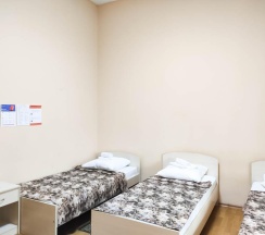 Кровать в 3-местном общем номере в Smart Hotel KDO Саранск