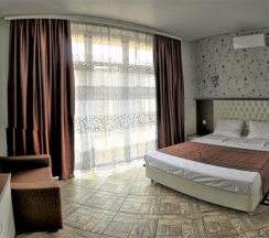 Семейный номер(двуспальная кровать, кресло-кровать) в Ленивый тюлень