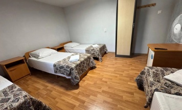 Четырёхместный семейный номер Стандартный Мансарда в Александра