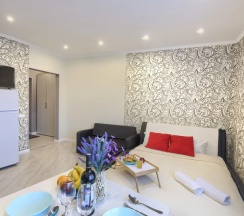 Апартаменты с балконом и с красивым видом из окна в Апартаменты Appartement De Luxe Дуэт
