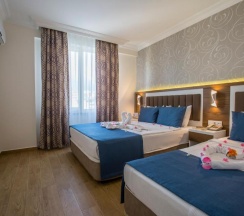Семейный люкс в Club Big Blue Suit Hotel