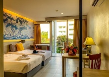 Двухместный номер Standard с балконом двуспальная кровать в Sino House Phuket Hotel