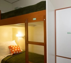 Кровать в общем номере в Brazilodge All Suites Hostel