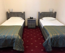 Трехместный номер с тремя кроватями в Спутник