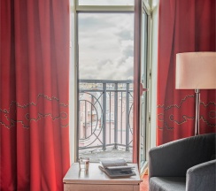 Улучшенный с балконом и видом на город в Cosmos St. Petersburg Nevsky Hotel