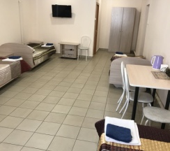 Кровать в общем номере с пятью кроватями в Парнас