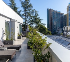 Люкс с террасой и видом на город и море в IL Punto