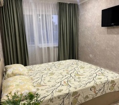 Двухместные апартаменты c 1 комнатой с балконом (двуспальная кровать) в Квартира Уютная в Центре
