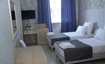 Номер стандарт с 2 односпальными кроватями №10 в Gold hotel
