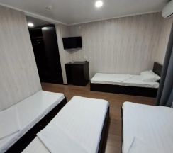 Комната стандарт с 4 односпальными кроватями в Аксай