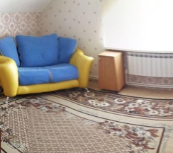 Кровать в 3-местном общем номере в Рябиновый