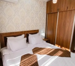 Четырёхместный номер Standard в Diyor Gold Hotel