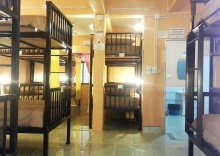 Кровать в общем номере в Jinda Hostel