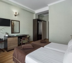 Стандарт с видом на бассейн с креслом в Pontos Family Resort Hotel