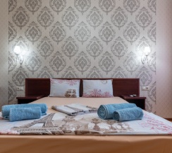 Двухместный номер Standard с балконом и с красивым видом из окна двуспальная кровать в Гостевой дом