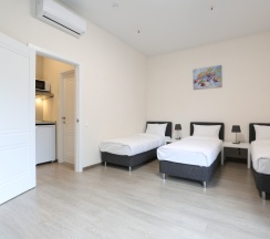 STUDIO Улучшенные 4 местные бюджетные студии с 4 кроватями в Апартаменты