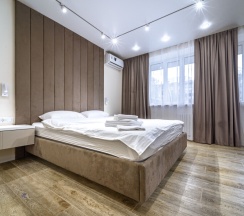 Люкс №11 с террасой в Портал Апартментс