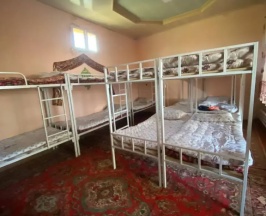 Кровать в общем номере в Гостевой дом Guest House Ozod