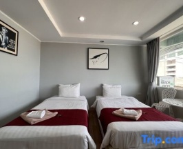 Двухместный номер Deluxe с частичным видом на море 2 отдельные кровати в The Beach Front Resort Pattaya  - SHA Plus