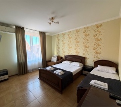 Стандартный четырехместный комната в Das house