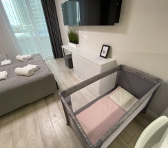 Двухместная студия Deluxe с балконом двуспальная кровать в Апартаменты Новая в Престижном ЖК Минск-Мир