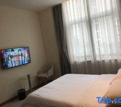 Двухместный номер Business двуспальная кровать в Wenzhou New Day High-speed Railway Business Hotel