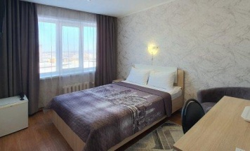 Номер стандарт с 1 двуспальной кроватью в Советская Гавань