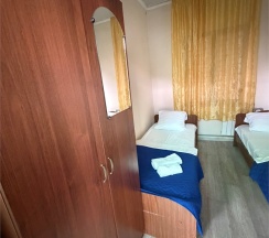 Двухместный  номер эконом с отдельными кроватями в День-Ночь