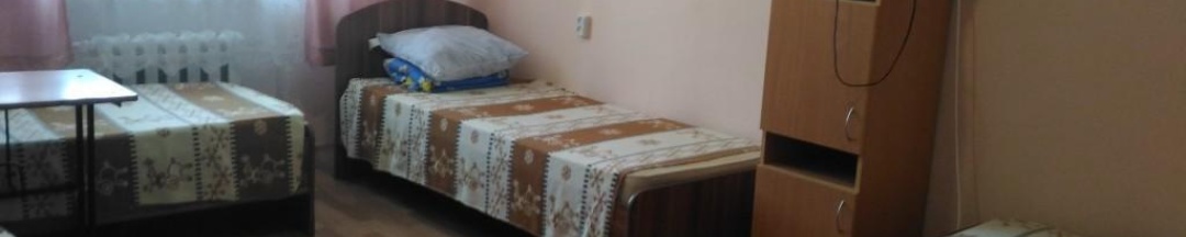 Кровать в 9-местном общем номере в Восток на Володарского