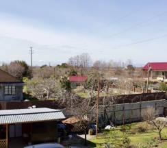 Четырёхместный номер Standard с балконом и с красивым видом из окна в Гостевой дом