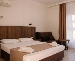 Трёхместный номер Deluxe с балконом и с видом на горы в Талион