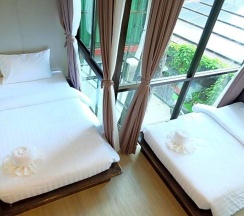 Двухместный номер Deluxe с балконом 2 отдельные кровати в Aplus Deluxe Hotel