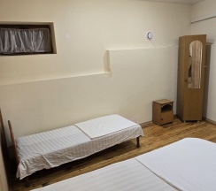 2-комнатная комната стандарт с 2 односпальными и 2 двуспальными кроватями в Саймон