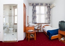 Четырёхместный семейный номер Standard в Broadway City Guesthouse