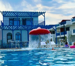 Двухуровневый ПОЛУЛЮКС с зоной отдыха на крыше в Santorini Family Club