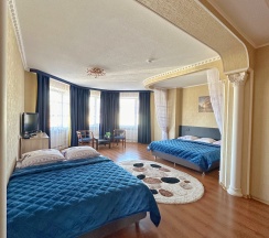 Улучшенный четырехместный номер в Relax